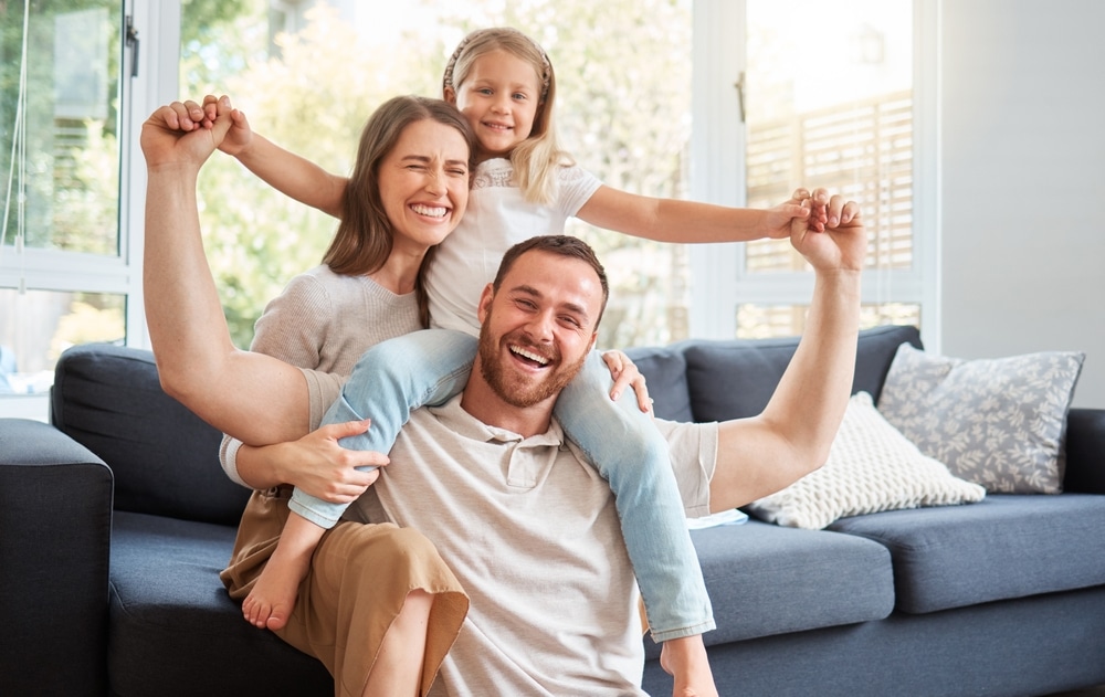 Smile,,Family,And,Portrait,On,Shoulder,By,Sofa,For,Weekend